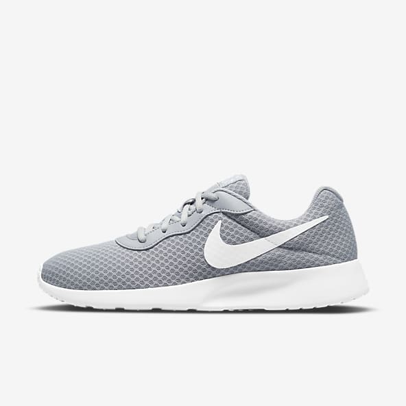 Tenis nike hombre gris top
